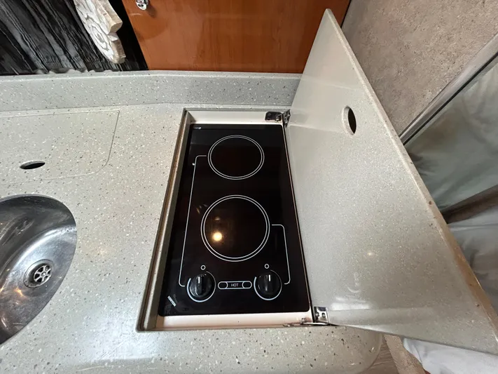  Yacht Photos Pics 2005 Formula 37 PC yacht kitchen with electric stove and sink.