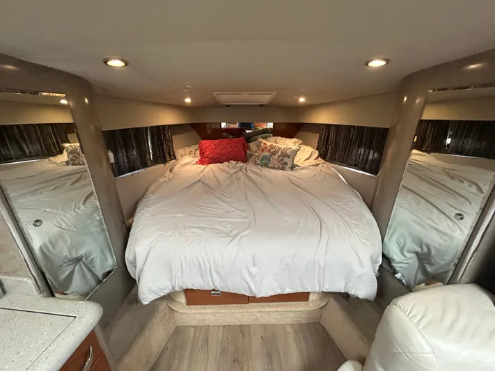  Yacht Photos Pics Luxurious cabin interior of a 2005 Formula 37 PC yacht with cozy bedding.