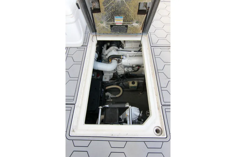 Pal'party Yacht Photos Pics Engine compartment of 2000 Sea Ray 450 Express Bridge, showcasing mechanical components.