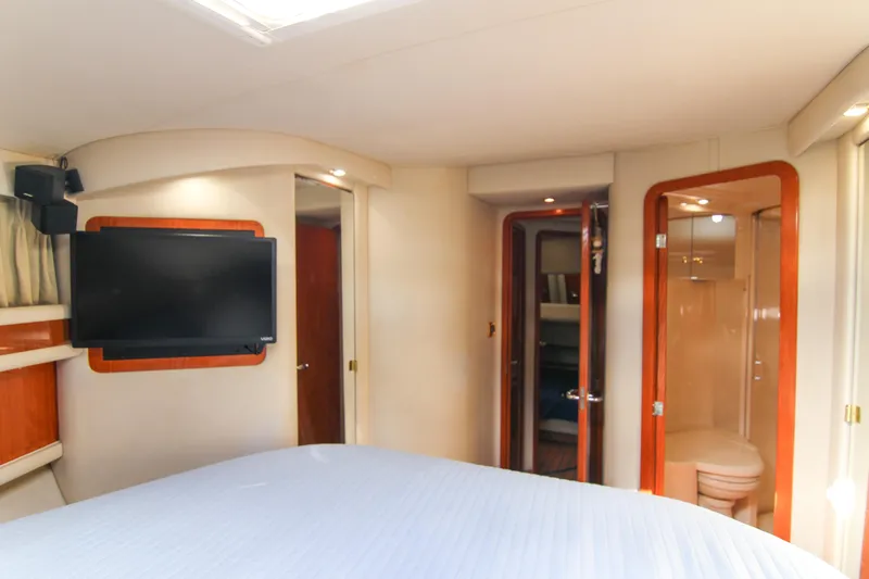 Pal'party Yacht Photos Pics Interior of 2000 Sea Ray 450 Express Bridge with TV and ensuite bathroom.