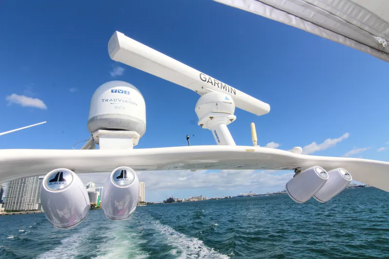 Pal'party Yacht Photos Pics Sea Ray 450 Express Bridge 2000 with Garmin and TracVision equipment on open water.