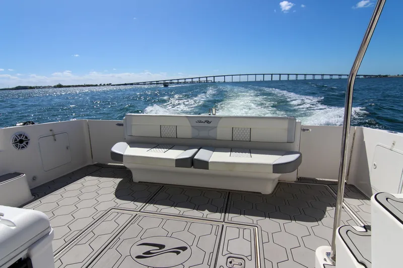 Pal'party Yacht Photos Pics 2000 Sea Ray 450 Express Bridge cruising on open water, featuring spacious deck seating.