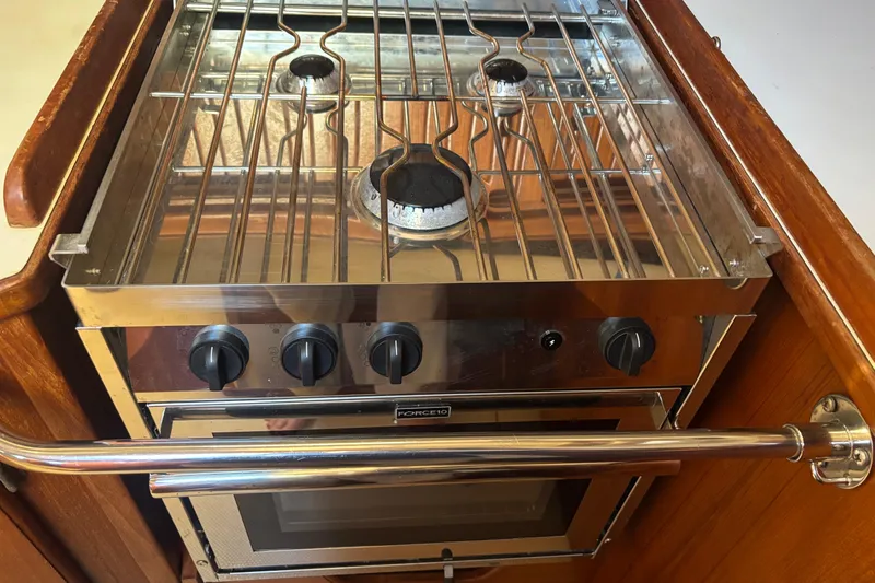 Inspiration Yacht Photos Pics Stainless steel stove and oven in 1989 Island Packet 38 yacht kitchen.