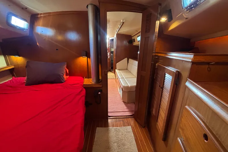 Inspiration Yacht Photos Pics Interior of 1989 Island Packet 38 sailboat with cozy cabin and wooden furnishings.