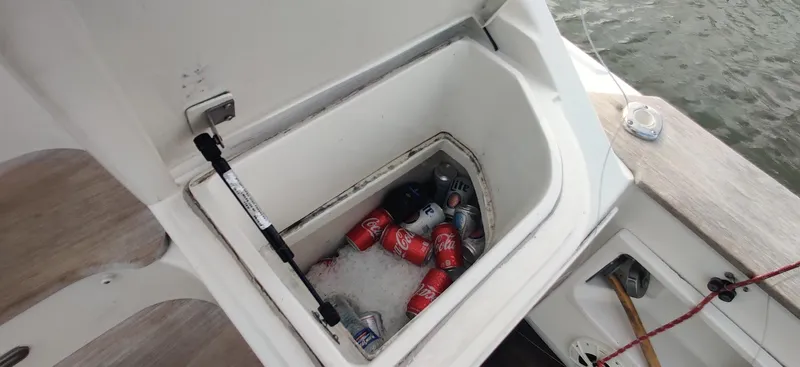 Short People Yacht Photos Pics Cooler with drinks and ice on 1999 Ocean Yachts EXPRESS boat deck.