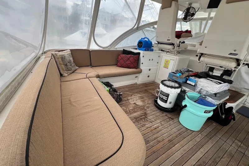 Short People Yacht Photos Pics 1999 Ocean Yachts EXPRESS SPORTFISH 800 CAT's interior with seating and equipment.