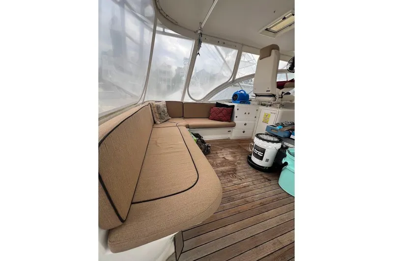 Short People Yacht Photos Pics 1999 Ocean Yachts EXPRESS SPORTFISH 800 CAT's interior with seating and equipment.