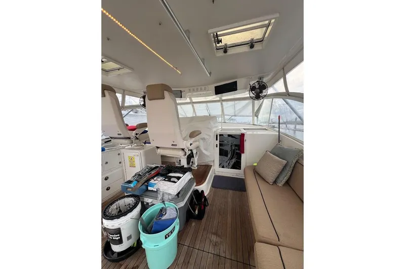 Short People Yacht Photos Pics 1999 Ocean Yachts EXPRESS SPORTFISH 800 CAT's interior with seating and equipment.