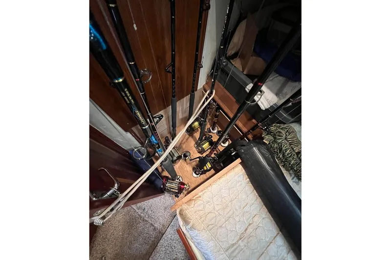 Short People Yacht Photos Pics Fishing rods stored inside 1999 Ocean Yachts EXPRESS SPORTFISH 800 CAT's cabin.
