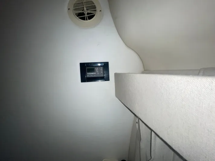  Yacht Photos Pics Interior of 2019 Regal 28 Express boat with Dometic control panel and vent.