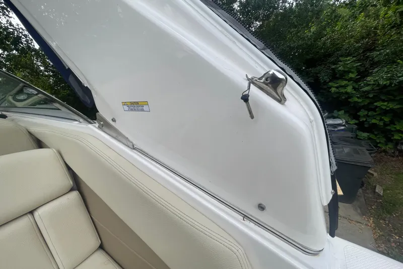  Yacht Photos Pics 2019 Regal 28 Express boat interior with open hatch and key.