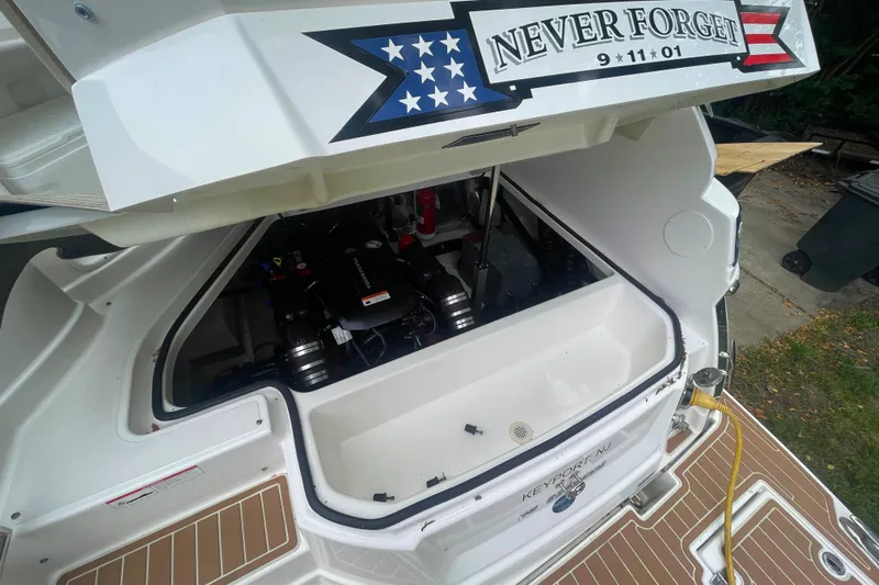 Yacht Photos Pics 2019 Regal 28 Express boat engine compartment with "Never Forget 9-11-01" decal.