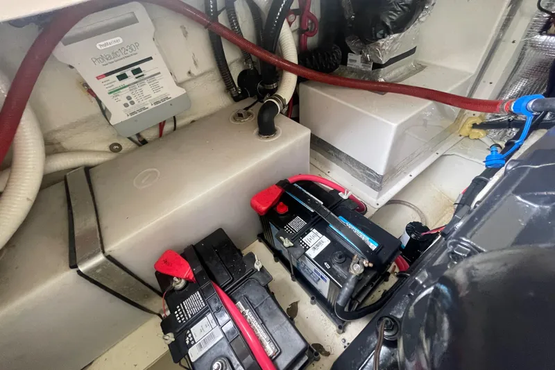  Yacht Photos Pics Engine compartment of a 2019 Regal 28 Express with batteries and wiring.