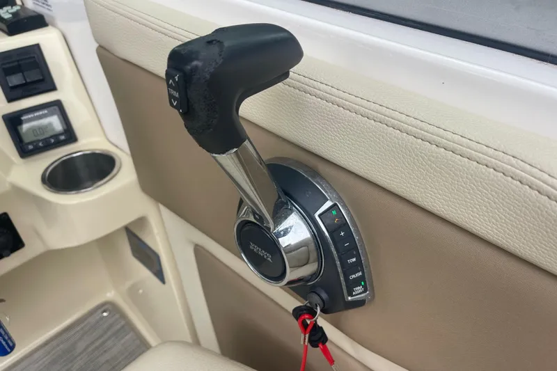  Yacht Photos Pics Throttle control lever on a 2019 Regal 28 Express boat dashboard.