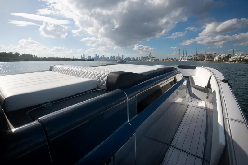  Yacht Photos Pics Sardine Marine Custom Race 55 yacht, 2025 model, cruising with city skyline backdrop.