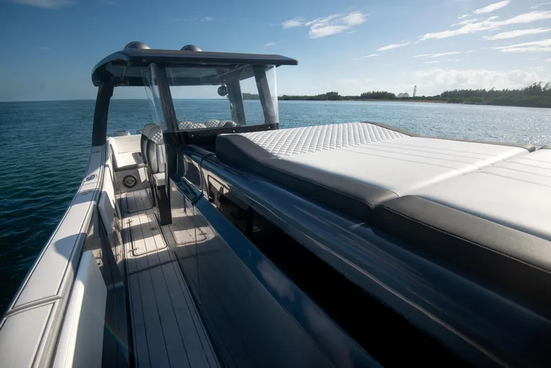  Yacht Photos Pics 2025 Sardine Marine Custom Race 55 yacht on open water, sleek design, sunny day.