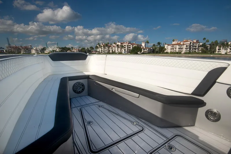  Yacht Photos Pics 2025 Sardine Marine Custom Race 55 boat interior with sleek seating and waterfront view.