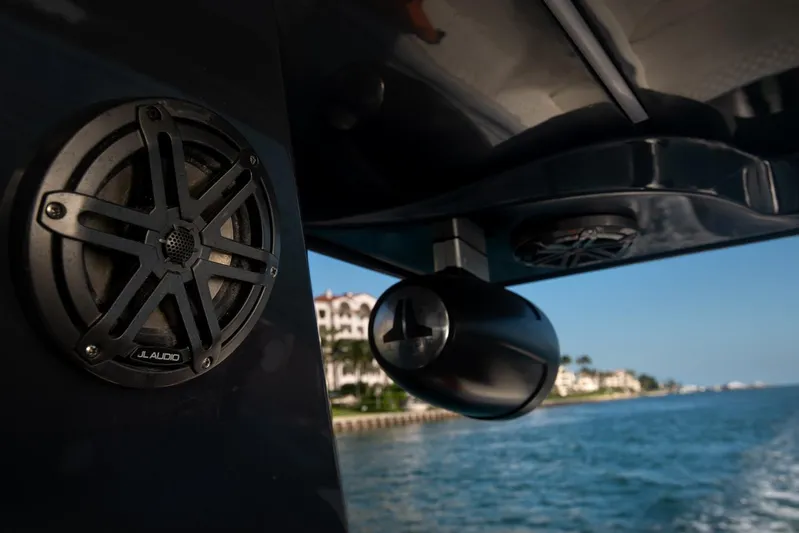  Yacht Photos Pics Close-up of Sardine Marine Custom Race 55 boat speakers, 2025 model, with ocean view.
