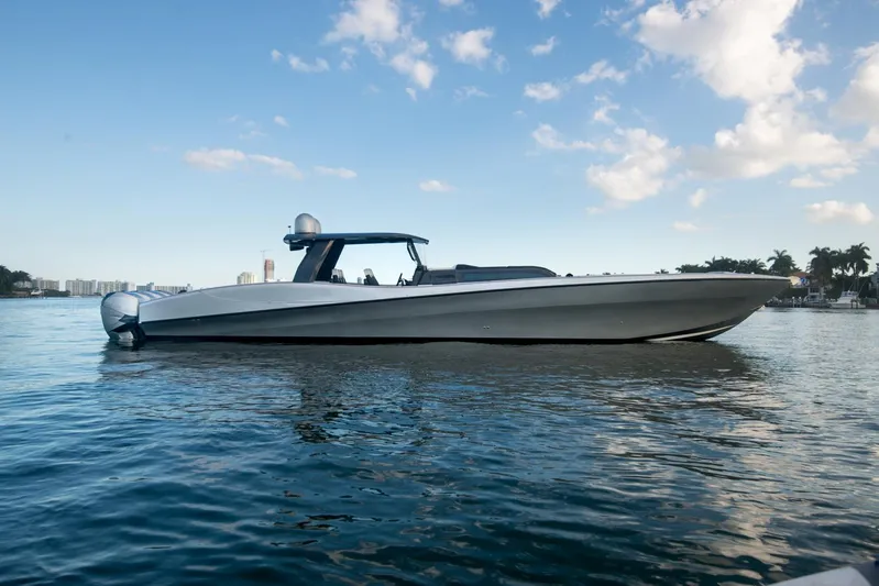  Yacht Photos Pics Sardine Marine Custom Race 55 boat on water, 2025 model, under blue sky.