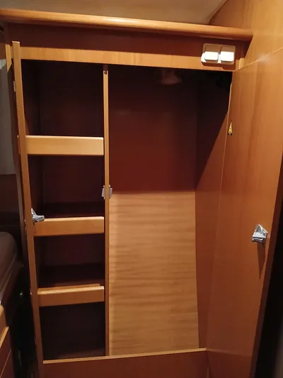 Double Diamond Yacht Photos Pics Wooden interior closet on a 2007 Lagoon 380 S2 yacht.