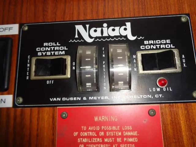 Hatty Shack Yacht Photos Pics Naiad control panel on 1989 Hatteras 67 Cockpit Motor Yacht, featuring roll and bridge control systems.