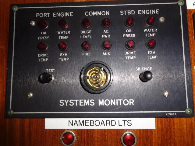 Hatty Shack Yacht Photos Pics Hatteras 67 Cockpit Motor Yacht 1989 systems monitor panel with engine indicators.