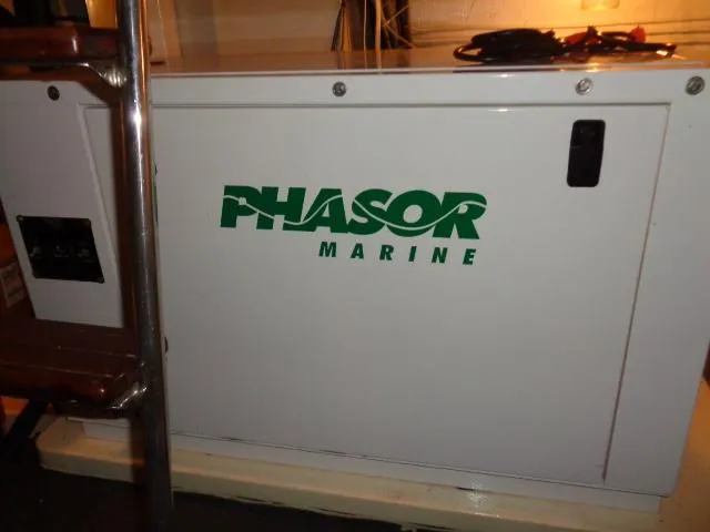 Hatty Shack Yacht Photos Pics Phasor Marine generator on 1989 Hatteras 67 Cockpit Motor Yacht.