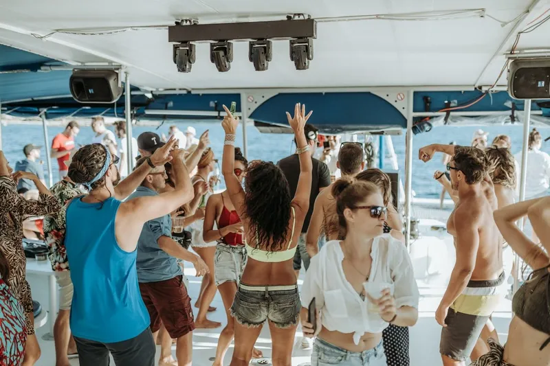 Tahiti Yacht Photos Pics People dancing on a 2015 Fountaine Pajot TAHITI catamaran during a lively boat party.