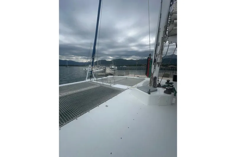 Tahiti Yacht Photos Pics 2015 Fountaine Pajot TAHITI catamaran deck with overcast sky and marina view.