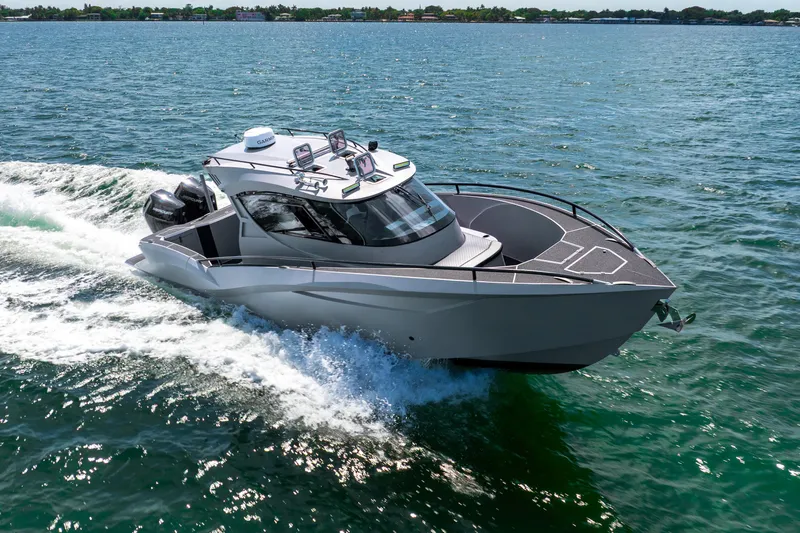  Yacht Photos Pics 2025 Novielli SERE boat cruising on open water, showcasing sleek design and advanced technology.