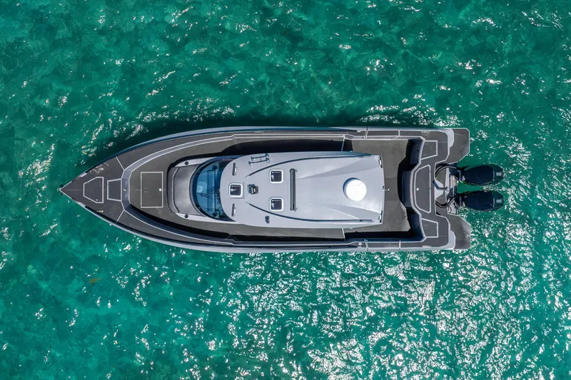  Yacht Photos Pics Aerial view of 2025 Novielli SERE yacht on turquoise water.