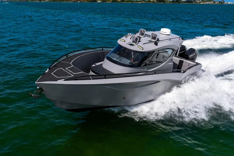  Yacht Photos Pics 2025 Novielli SERE boat cruising on open water, showcasing sleek design and advanced technology.