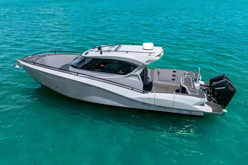  Yacht Photos Pics 2025 Novielli SERE boat on turquoise water, showcasing sleek design and modern features.