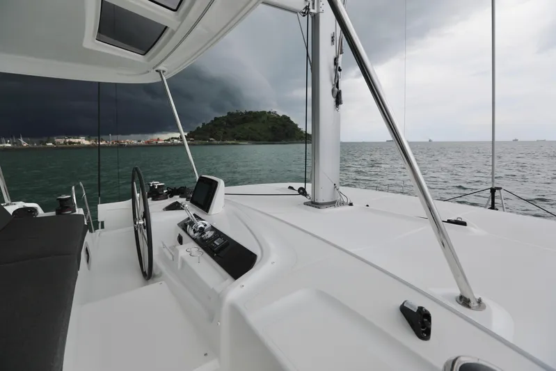 Babur Yacht Photos Pics Lagoon 46 catamaran 2021 model, helm station with stormy sea view.