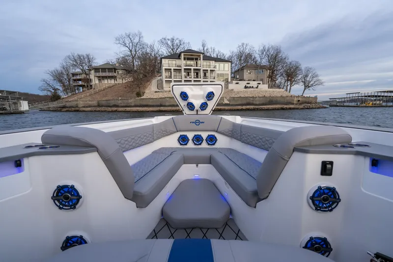  Yacht Photos Pics Luxurious 2026 Fountain 38 SCX boat interior with modern seating and waterfront view.