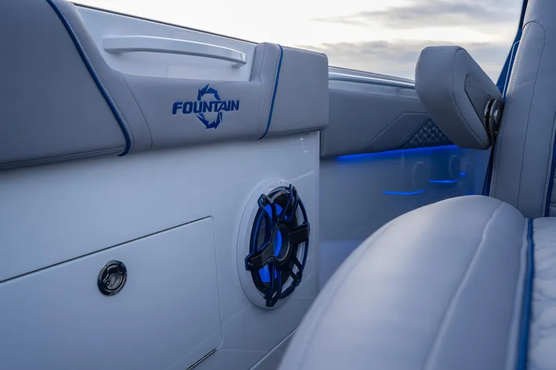  Yacht Photos Pics 2026 Fountain 38 SCX boat interior with blue LED lighting and speaker detail.