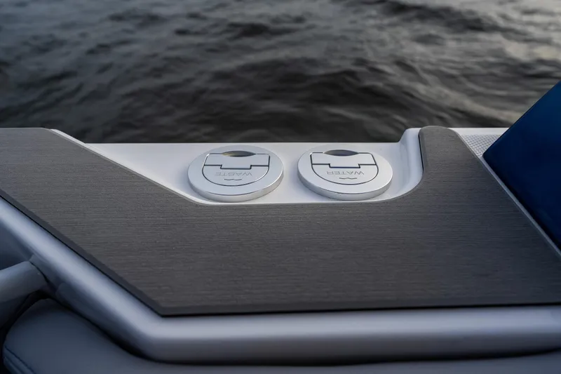  Yacht Photos Pics 2026 Fountain 38 SCX boat deck with waste and water access panels.