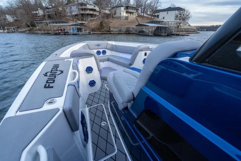  Yacht Photos Pics 2026 Fountain 38 SCX boat interior with modern seating and waterfront view.