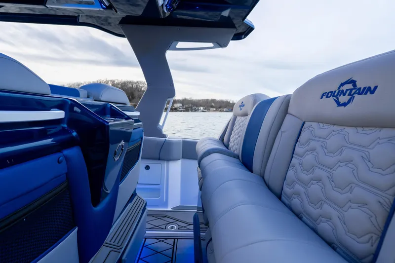  Yacht Photos Pics Luxurious interior of 2026 Fountain 38 SCX boat with stylish seating and modern design.