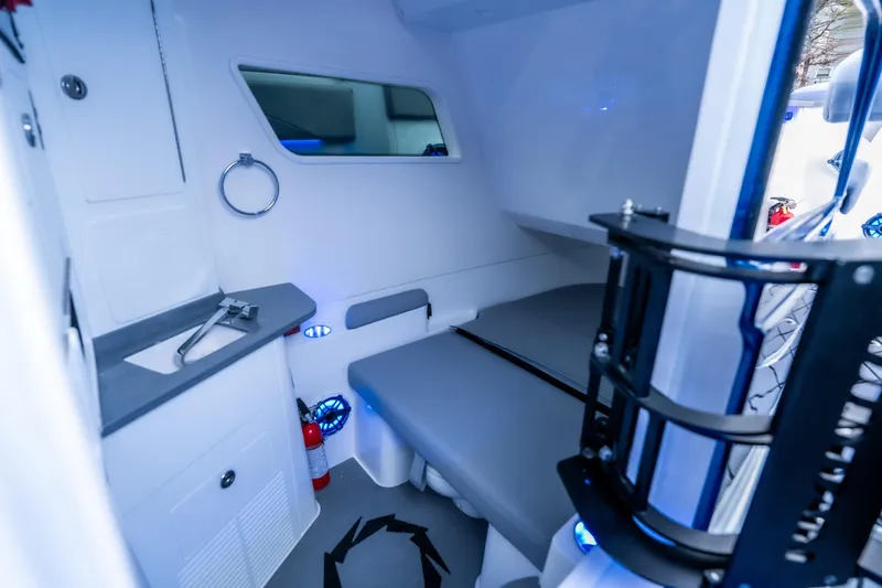  Yacht Photos Pics Interior cabin of 2026 Fountain 38 SCX boat with modern amenities and seating.