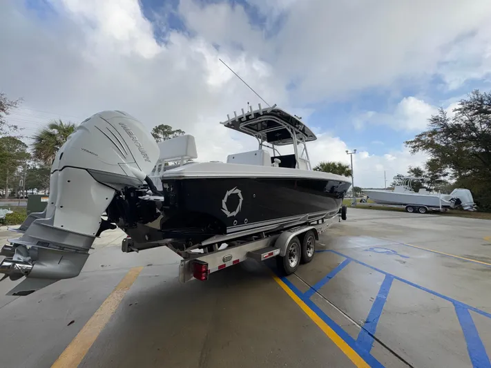  Yacht Photos Pics 2018 Fountain 34 CC boat on trailer with dual outboard engines.