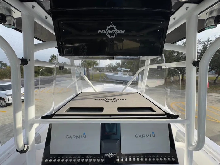  Yacht Photos Pics 2018 Fountain 34 CC boat dashboard with Garmin navigation system.