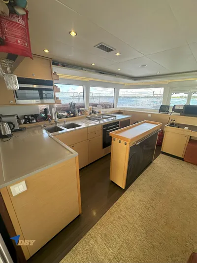 Samadhi Yacht Photos Pics Spacious kitchen interior of 2019 Lagoon 560 S2 yacht with modern appliances.