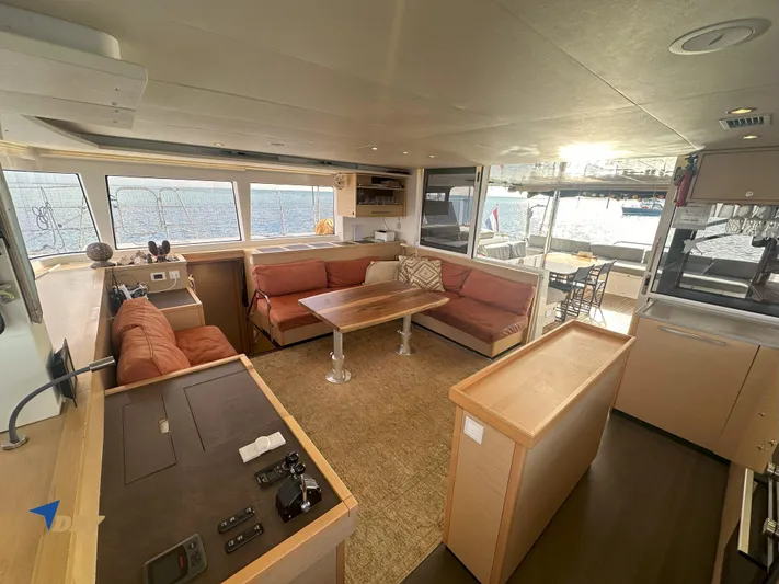 Samadhi Yacht Photos Pics Spacious interior of 2019 Lagoon 560 S2 yacht with comfortable seating and modern design.