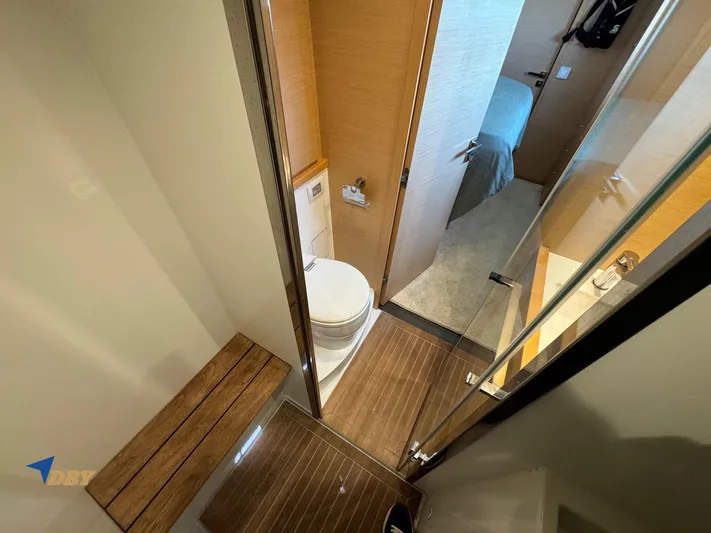 Samadhi Yacht Photos Pics 2019 Lagoon 560 S2 yacht bathroom with wooden flooring and modern fixtures.