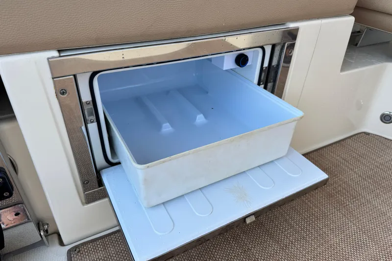  Yacht Photos Pics 2021 Chris-Craft Launch 31 GT boat storage compartment with open drawer.