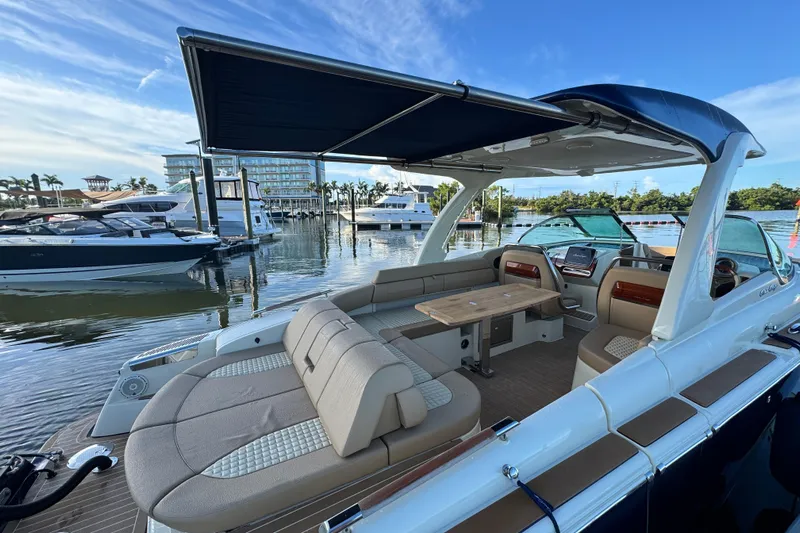  Yacht Photos Pics 2021 Chris-Craft Launch 31 GT luxury boat with spacious seating and elegant design at marina.