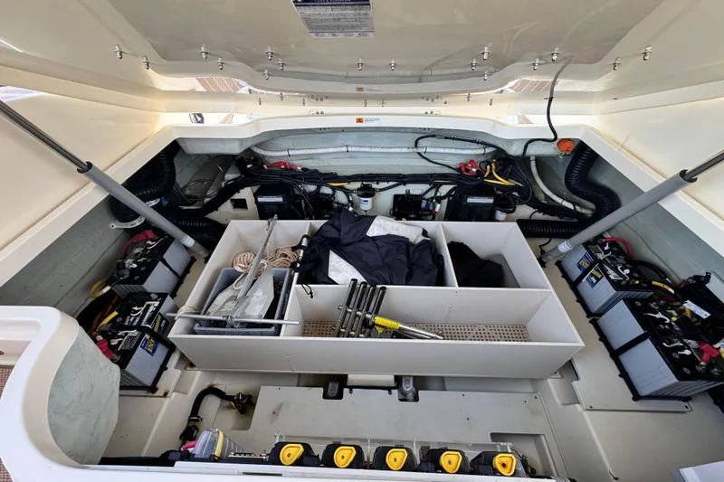  Yacht Photos Pics 2021 Chris-Craft Launch 31 GT engine compartment with organized storage and battery setup.