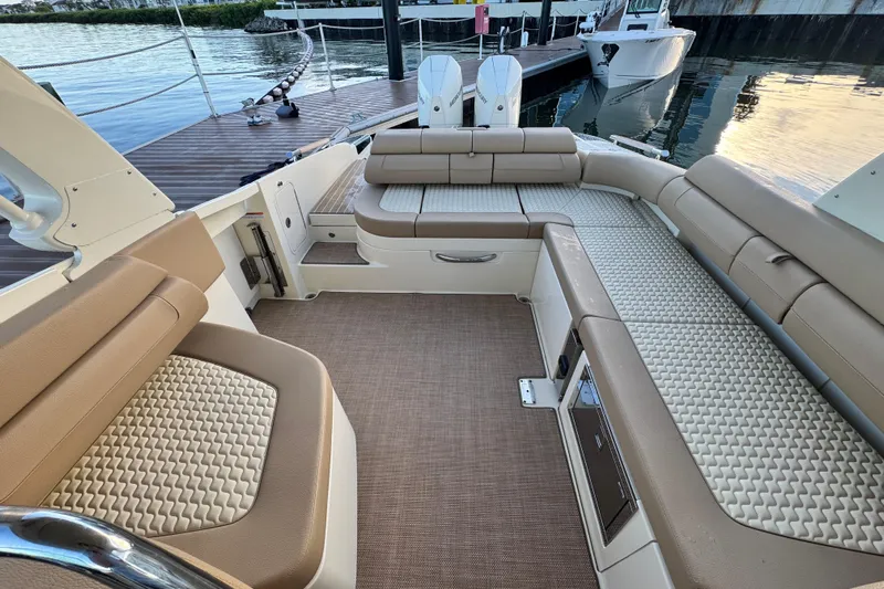  Yacht Photos Pics 2021 Chris-Craft Launch 31 GT boat interior with beige seating and modern design.
