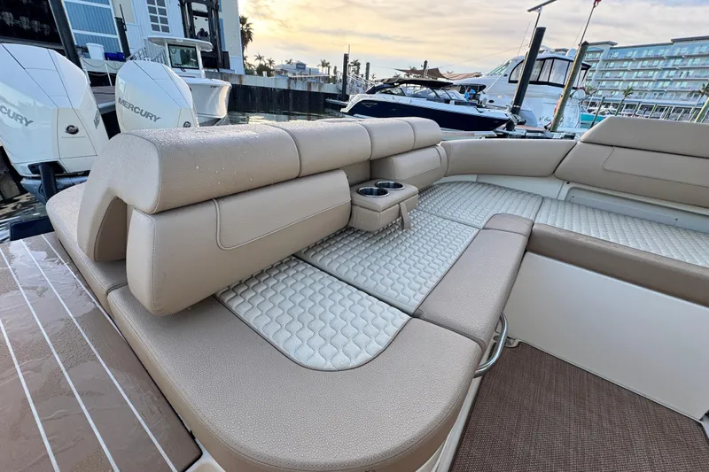  Yacht Photos Pics 2021 Chris-Craft Launch 31 GT boat interior with luxurious seating and cup holders.